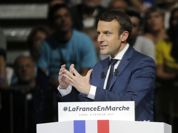 Presidential candidate Emmanuel Macron gestures as he speaks during a meeting in Lyon, central France, Saturday, Feb. 4, 2017. Untested former budget minister Emmanuel Macron, who rebelled against his ...