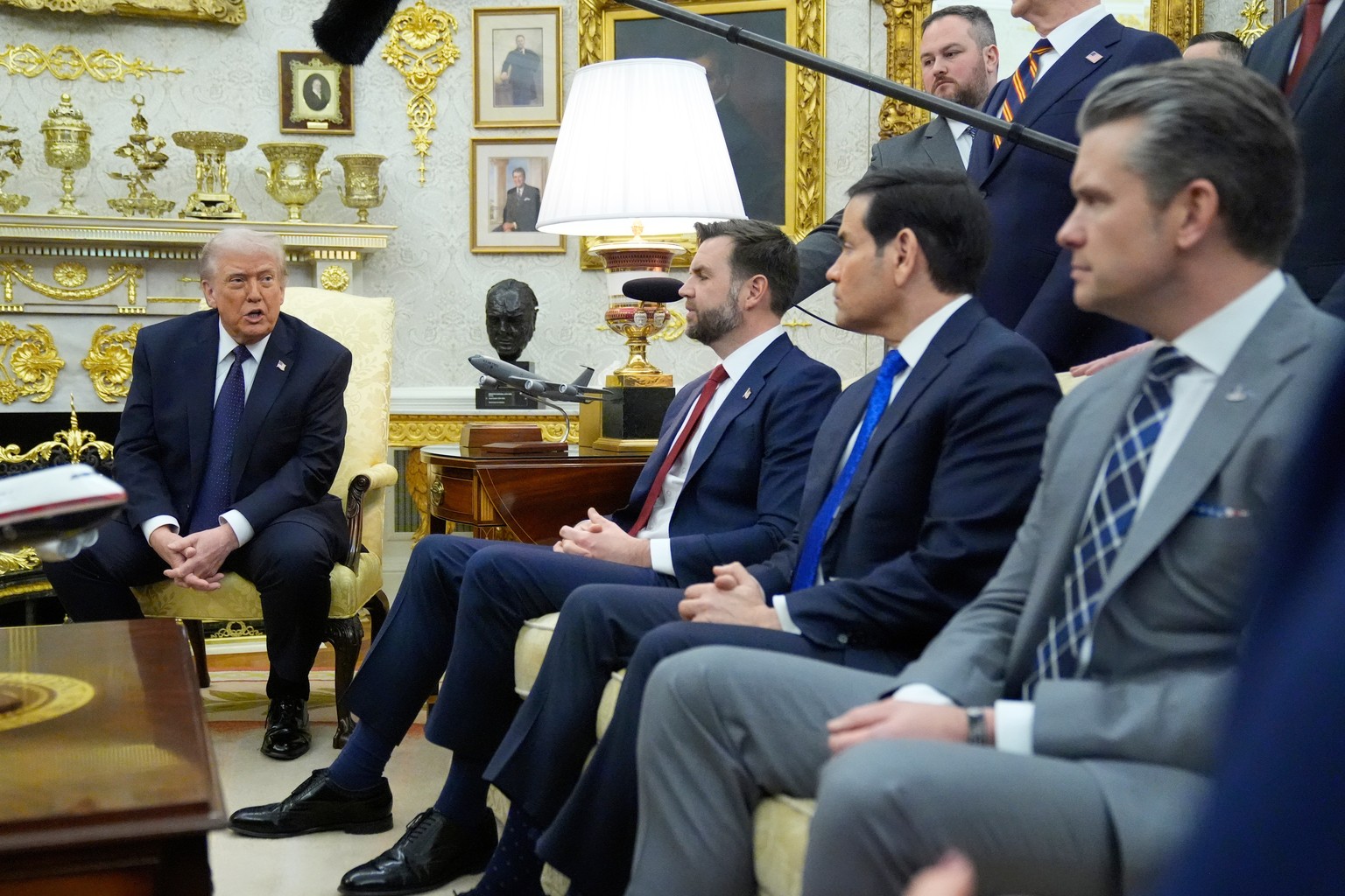 President Donald Trump speaks as, from, left, Vice President JD Vance, Secretary of State Marco Rubio and Defense Secretary Pete Hegseth listen during a meeting with German Chancellor Friedrich Merz i ...