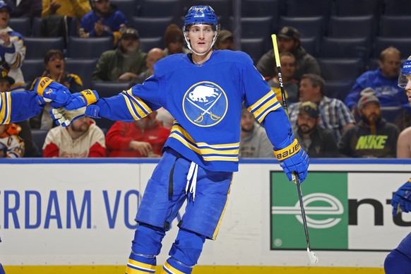 Buffalo Sabres right wing Tage Thompson (72) celebrates after his goal during the first period of an NHL hockey game against the Detroit Red Wings, Monday, Oct. 31, 2022, in Buffalo, N.Y. (AP Photo/Je ...