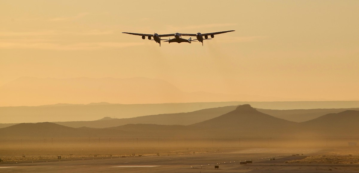 A jet carrying Virgin Galactic's tourism spaceship has taken off from Mojave Air and Space Port on Thursday, Dec. 13, 2018 in Mojave, Calif. The jet will climb to an altitude near 43,000 feet and ...