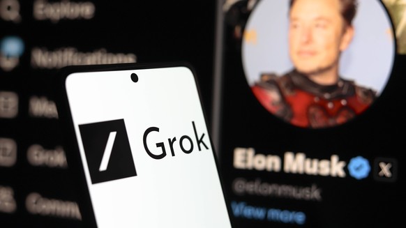 Photo illustration in Paraguay. In this photo illustration, the Grok logo seen displayed on a smartphone with the official profile of Elon Musk, of the social network X in the background. Paraguay Cop ...