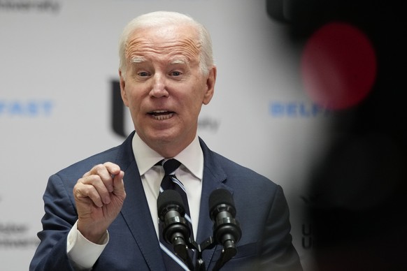 President Joe Biden gestures as he delivers a speech on Northern Ireland's enormous economic potential at the new campus of Ulster University in Belfast, Northern Ireland, Wednesday, April 12, 20...