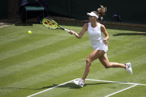 Belinda Bencic of Switzerland reacts during her first round match against Anastasia Pavlyuchenkova of Russia, at the All England Lawn Tennis Championships in Wimbledon, London, on Tuesday, July 2, 201 ...