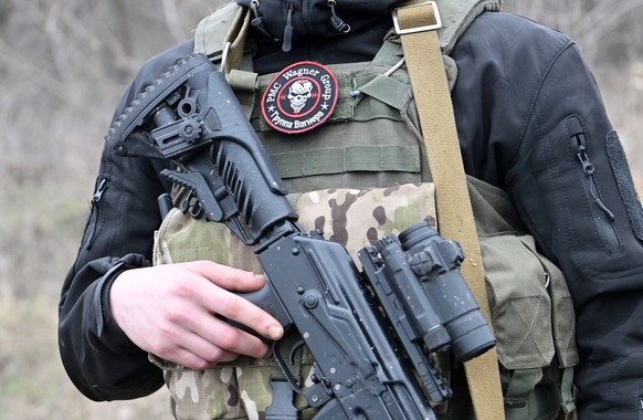 Russia Ukraine Military Operation Wagner Group 8389098 03/11/2023 A service member of the Russian private military company Wagner Group is seen in the village of Berkhovka, while the military operation of Russia ...