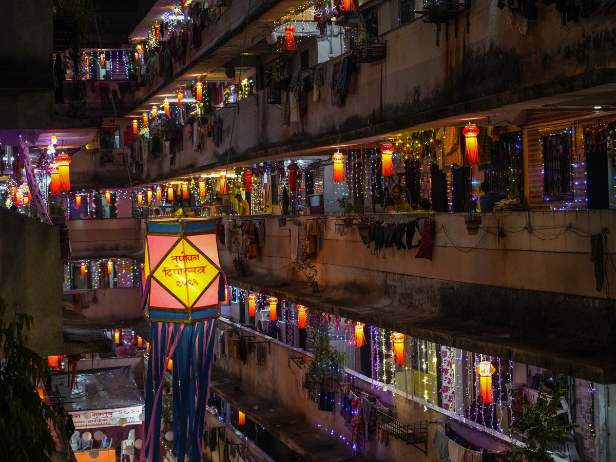 A residential building is decorated with lanterns and lights during Diwali, the festival of lights in Mumbai, India, Monday, Oct. 24, 2022. Indians across the country are celebrating Diwali, the Hindu ...