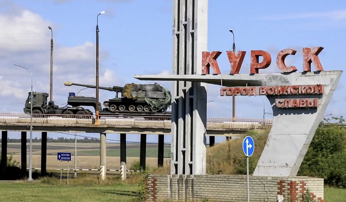 epa11542390 A still image taken from a handout video provided on 10 August 2024 by the Russian Defence Ministry shows Russian troops delivering military equipment to the Kursk region, Russia. Accordin ...