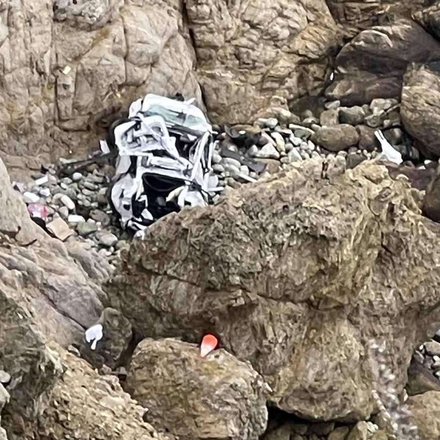 FILE - This image from a video from the San Mateo County Sheriff's Office shows a Tesla vehicle crashing off a cliff in Northern California along Pacific Coast Highway Monday, January 2, 2023, near…