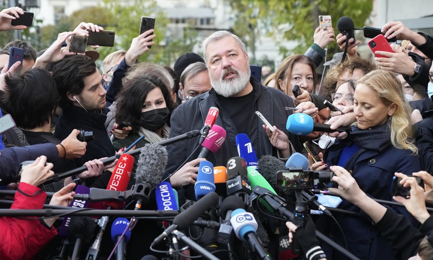 Novaya Gazeta editor Dmitry Muratov talks to media at the Novaya Gazeta newspaper, in Moscow, Russia, Friday, Oct. 8, 2021. As a new Nobel Peace Prize laureate, Russian newspaper editor Dmitry Muratov ...