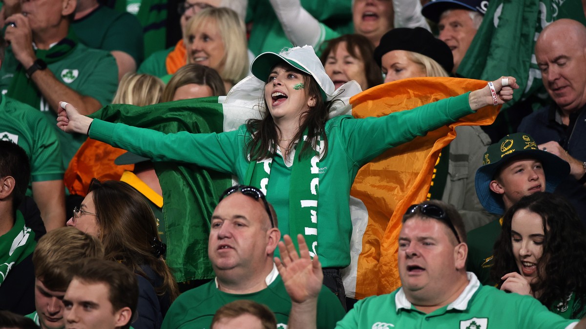 epa10879624 Irish fans celebrate after Ireland won the Rugby World Cup Pool B match between South Africa and Ireland in Saint- Denis, France, 23 September 2023. EPA/CHRISTOPHE PETIT TESSON