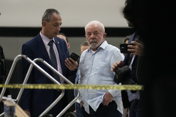Brazil&#039;s President Luiz Inacio Lula da Silva walks in Planalto Palace after it was stormed by supporters of Brazil&#039;s former President Jair Bolsonaro in Brasilia, Brazil, Sunday, Jan. 8, 2023 ...