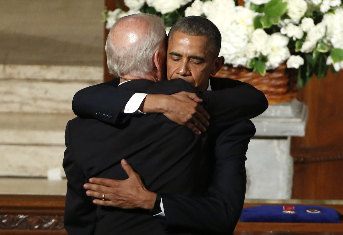 FILE - President Barack Obama hugs Vice President Joe Biden during funeral services for Biden's son, Beau Biden, at St. Anthony of Padua Church in Wilmington, Del., June 6, 2015. Historians and p ...