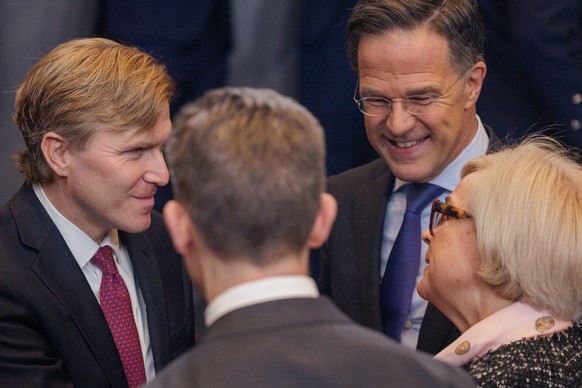 epa12730153 US Under Secretary of Defense Elbridge A. Colby (L), NATO Secretary General Mark Rutte (C), and Minister of the Armed Forces and Veterans of France Catherine Vautrin (R) during the meeting ...