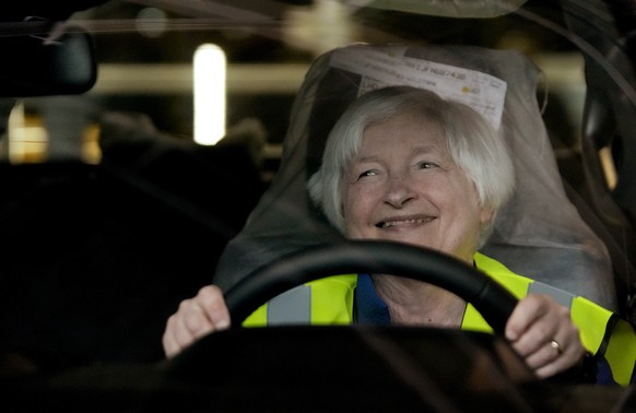U.S. Treasury Secretary Janet Yellen sits inside a newly assembled vehicle during her tour at the Ford Assembling Plant in Pretoria, South Africa, Thursday, Jan. 26, 2023. (AP Photo/Themba Hadebe)