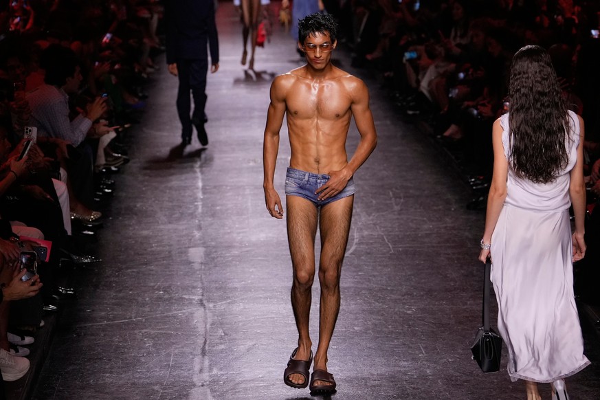 Models wear creations part of the Diesel women's Spring-Summer 2027 collection presented in Milan, Italy, Tuesday, Sept. 22, 2026. (AP Photo/Luca Bruno).
Italy Fashion Diesel S,S 27