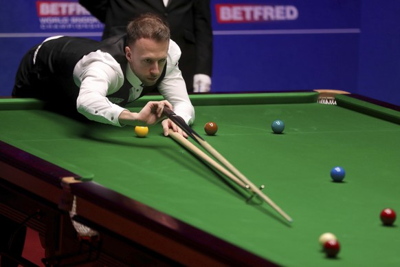 Judd Trump at the table during his match against John Higgins, during Final of the World Snooker Championship in Sheffield, England, Monday May 6, 2019.(Richard Sellers/PA via AP)