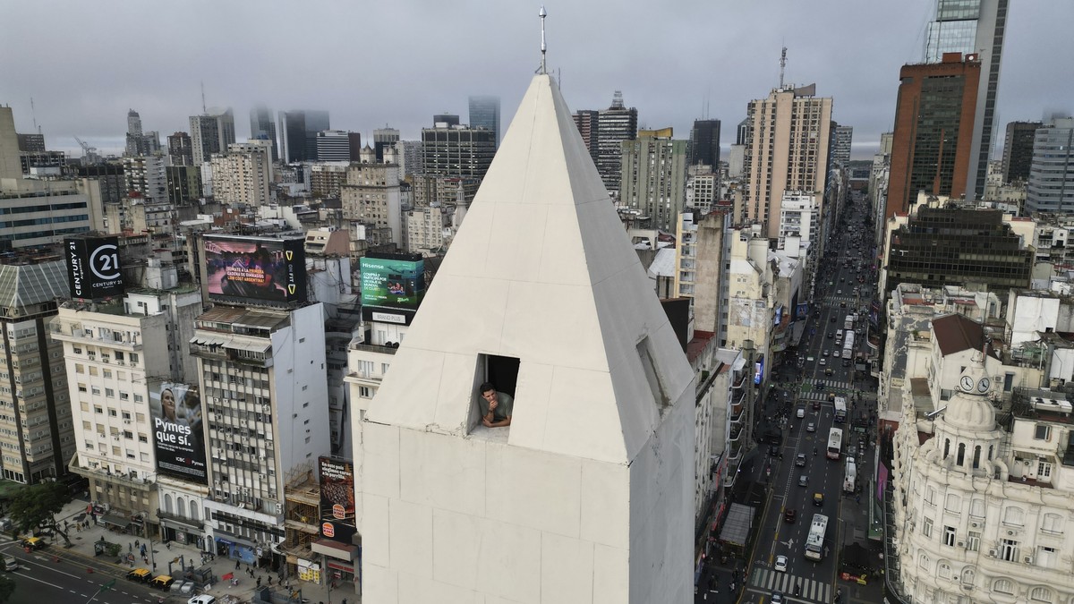 A person peers out of a lookout in the Obelisk during a city tour in Buenos Aires, Argentina, Thursday, May 8, 2025. (AP Photo/Victor R. Caivano)
Argentina Obelisk