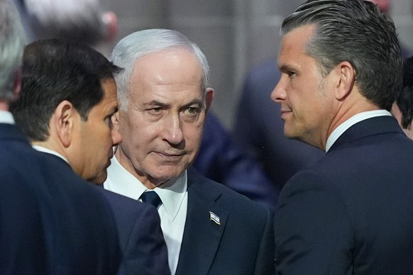 Israeli Prime Minister Benjamin Netanyahu, center, speaks to Secretary of Defense Pete Hegseth, right, and Secretary of State Marco Rubio, left, before the funeral of Sen. Lindsey Graham, R-S.C., Tues ...