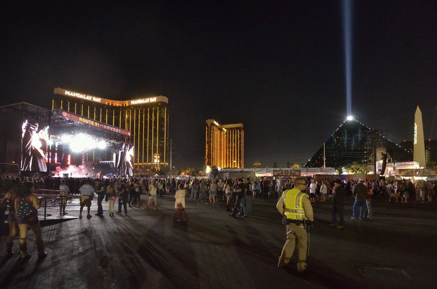 epa06239553 A handout photo made available by the Las Vegas News Bureau on 02 October showing the scene at the Route 91 Harvest festival on Las Vegas Boulevard South in Las Vegas 30 September, 2017. R ...