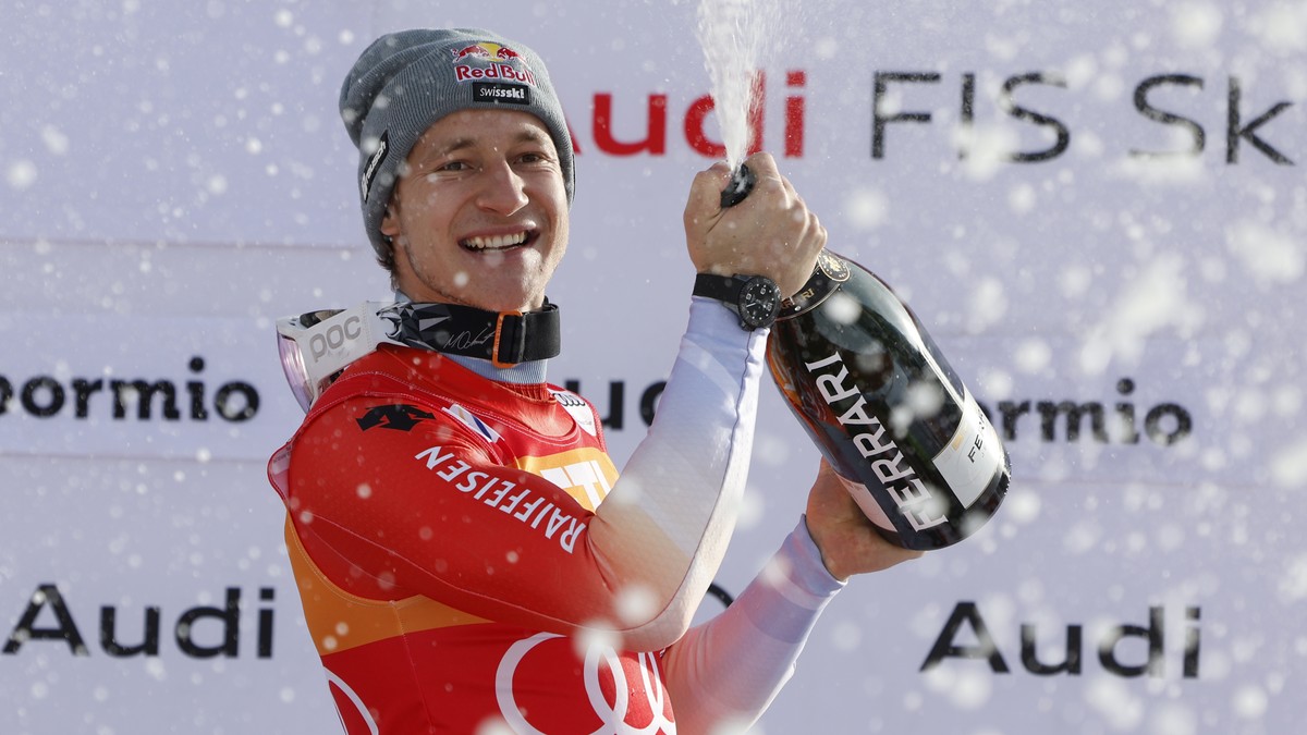 The winner Switzerland's Marco Odermatt celebrates after an alpine ski, men's World Cup Super G race, in Bormio, Italy, Friday, Dec. 29, 2023. (AP Photo/Alessandro Trovati)