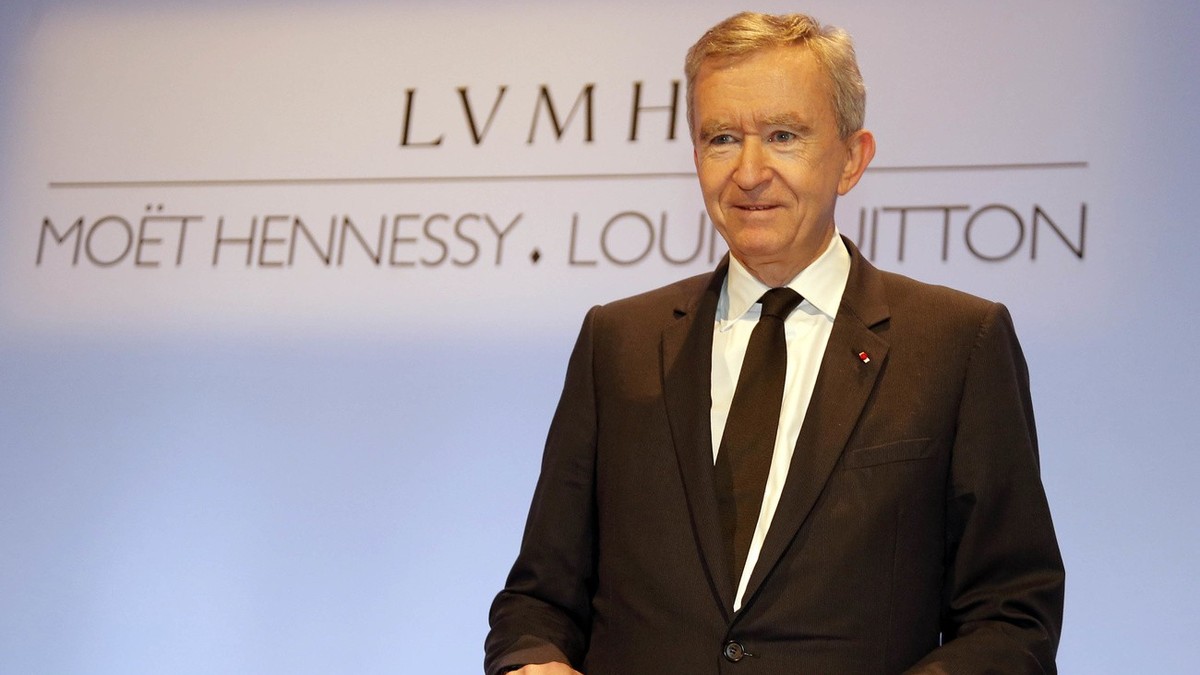 Bernard Arnault, Chairman and CEO of LVMH, Moet Hennessy Louis Vuitton, the Paris-based luxury goods empire, poses during the presentation of the 2012 year results, in Paris, Thursday, Jan. 31, 2013 . ...