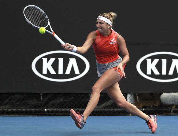 Switzerland&#039;s Timea Bacsinszky makes a forehand return to Russia&#039;s Natalia Vikhlyantseva during their second round match at the Australian Open tennis championships in Melbourne, Australia,  ...