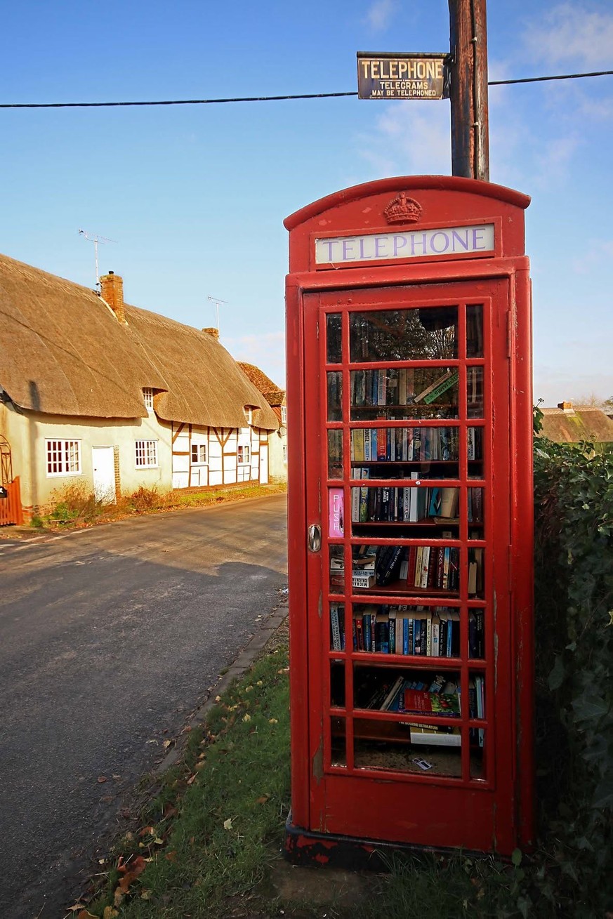 Telephone booth repurposed as a library. Longstock Village, England. 
https://www.facebook.com/photo/?fbid=10162344641630532&amp;set=gm.10156807301872883