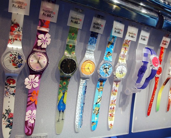 epa04056386 (FILE) A file photo dated 21 August 2002 showing Swatch watches at a company store in central Zurich, Switzerland. Swatch, the worlds biggest watchmaker, reports 05 February 2014 it increa ...