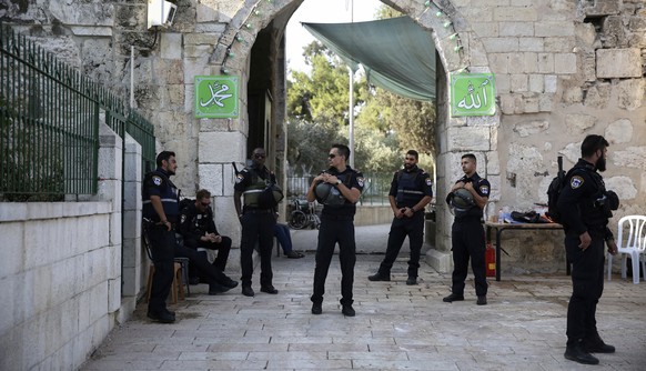 Israeli police officers stand outside the Al Aqsa Mosque compound in Jerusalem&#039;s Old City, Tuesday, July 25, 2017. Israel has begun dismantling metal detectors it installed a week earlier at the  ...