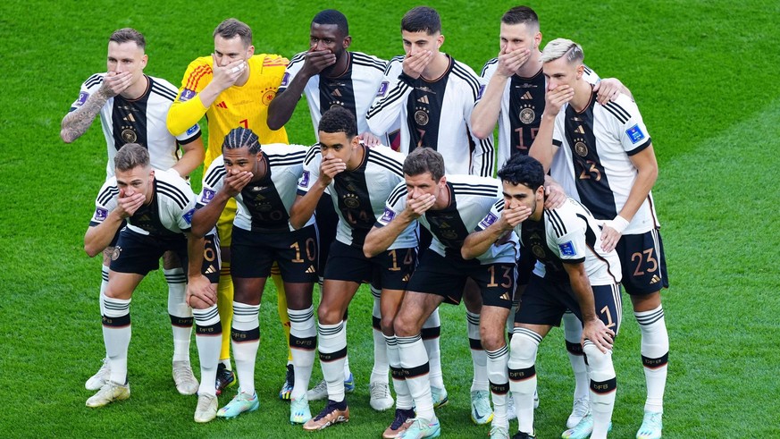 Mandatory Credit: Photo by Javier Garcia/Shutterstock 13626471f German players cover there mouths in protest as they pose for a team photo Germany v Japan, FIFA World Cup, WM, Weltmeisterschaft, Fussb ...