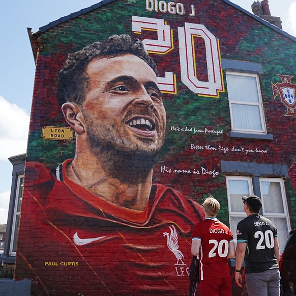 Liverpool fans visit a Diogo Jota mural before the pre-season friendly match at Anfield, Liverpool, England, Monday, Aug. 4 ,2025. (Peter Byrne/PA via AP)
Britain Liverpool Jota