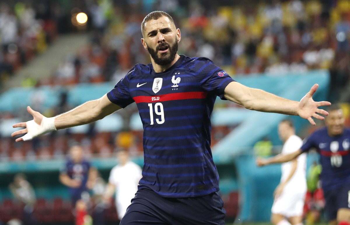 France's Karim Benzema celebrates after scoring his side's second goal during the Euro 2020 soccer championship round of 16 match between France and Switzerland at the National Arena stadium ...
