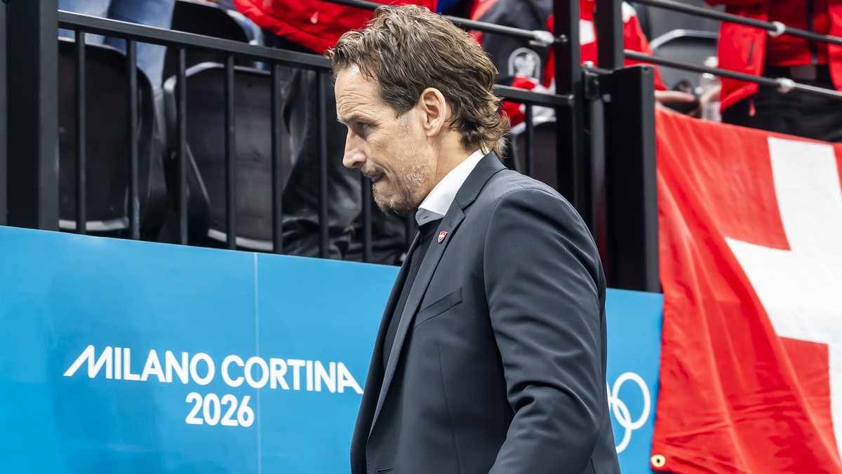 Patrick Fischer, head coach of Switzerland national ice hockey team, looks disappointed as they leave his bench after the second period, during the men's group A preliminary round game between Ca ...