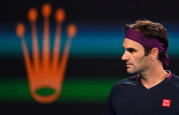 epa08158703 Roger Federer of Switzerland during his third round match against John Millman of Australia on day five of the Australian Open tennis tournament at Rod Laver Arena in Melbourne, Australia, ...