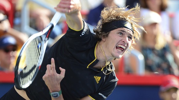 Alexander Zverev, of Germany, serves to Roger Federer, of Switzerland, during the final of the Rogers Cup tennis tournament Sunday, Aug. 13, 201, in Montreal. (Paul Chiasson/The Canadian Press via AP)