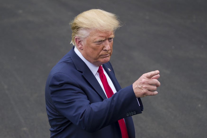 FILE - In this Sept. 9, 2019, file photo President Donald Trump speaks with reporters before departing on Marine One from the South Lawn of the White House in Washington. Trump has risked turmoil in t ...