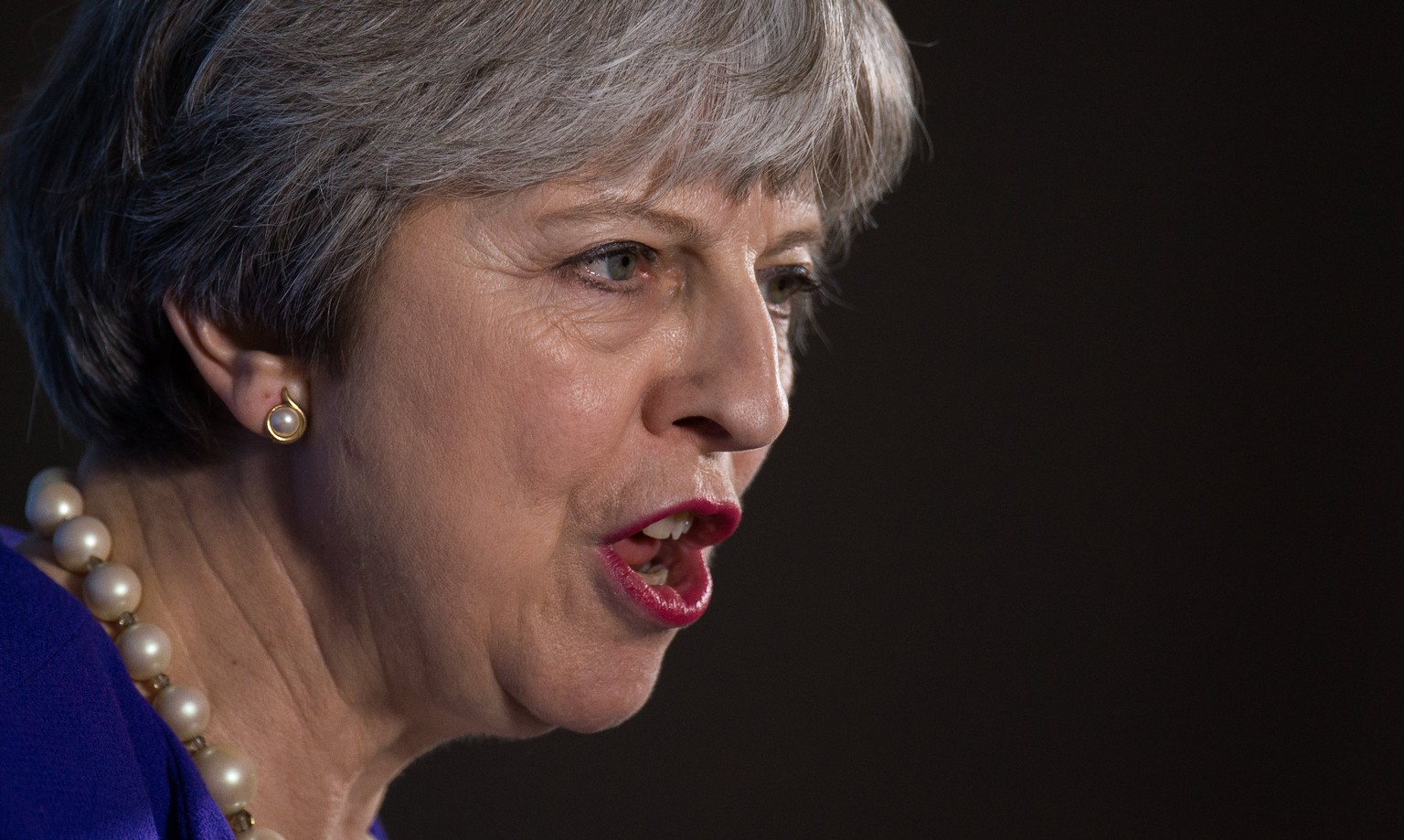 epa06500415 British Prime Minister Theresa May giving a speech to mark the centenary of the 1918 Representation of the People Act held in Manchester, North West England, 06 February 2018. The Represen ...