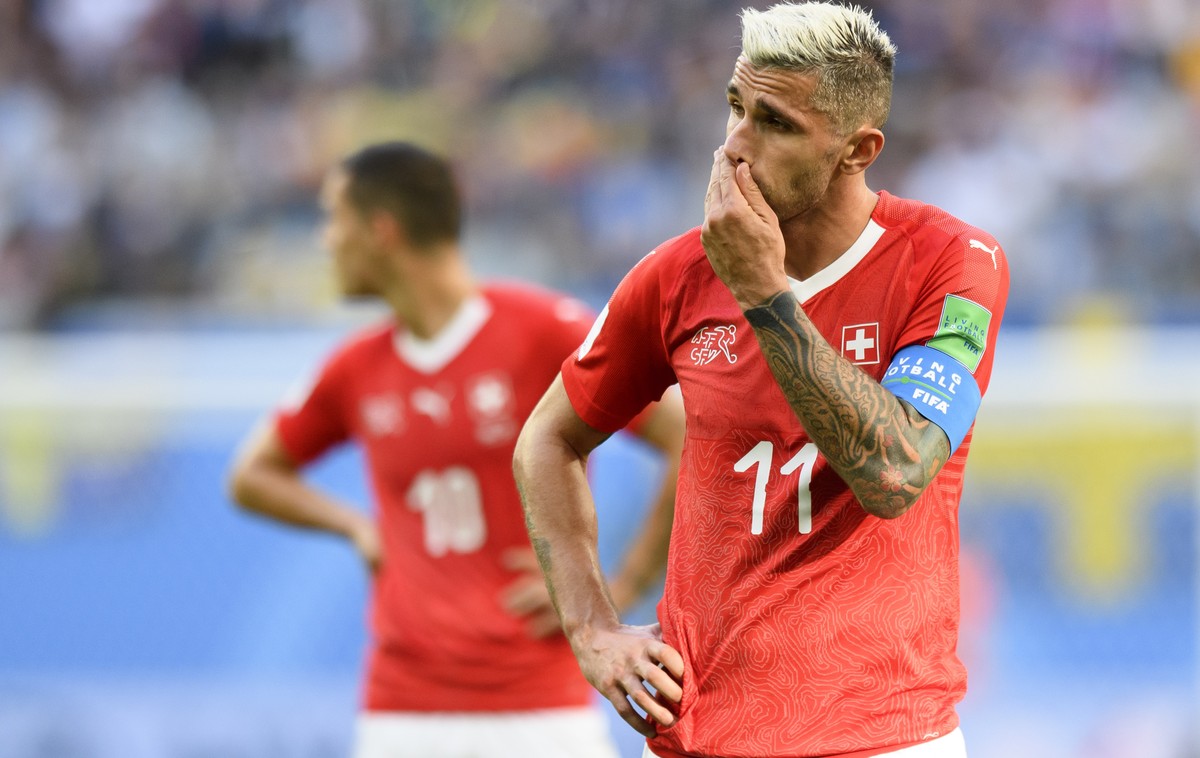 Switzerland's midfielder Valon Behrami reacts during the FIFA World Cup 2018 round of 16 soccer match between Sweden and Switzerland at the Krestovski Stadium, in St. Petersburg, Russia, Tuesday, ...