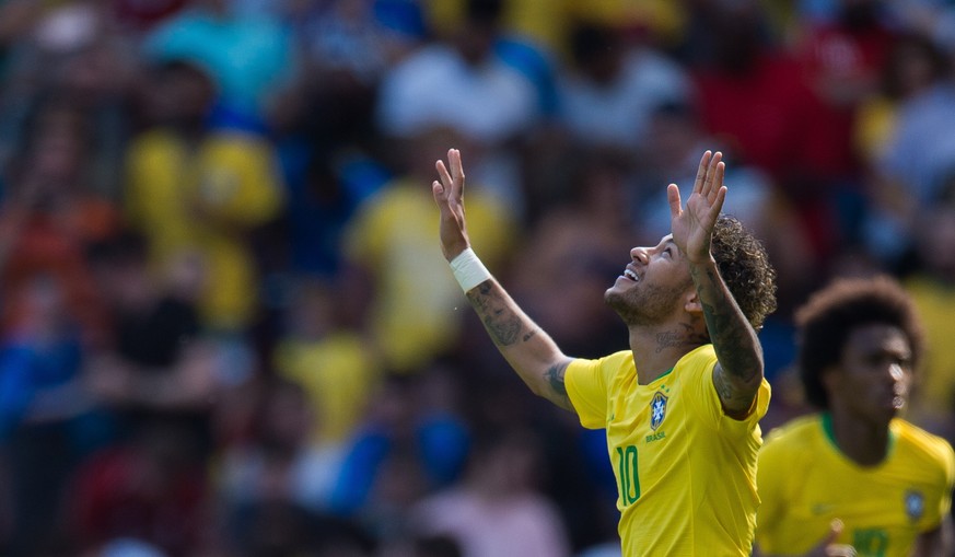 epa06782884 Brazil’s Neymar celebrates scoring the 1-0 lead during the international soccer friendly match between Brazil and Croatia at Anfield in Liverpool, Britain, 03 June 2018. EPA/PETER POWELL