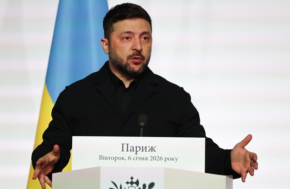 Ukraine's President Volodymyr Zelenskyy delivers a speech after the signing of the declaration on deploying post-ceasefire force in Ukraine during the 'Coalition of the Willing' summit  ...