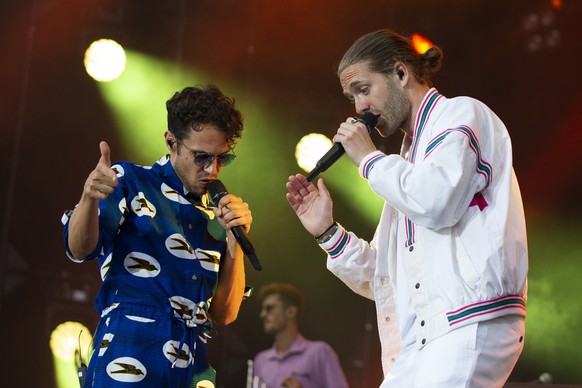 Luc Oggier, left, and Lorenz Haeberli of the Swiss band 'Lo and Leduc' perform on the main stage during the 36th edition of the Gurten music open air festival in Bern, Switzerland, Saturday, ...