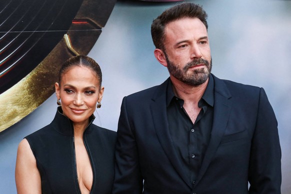 The Flash Premiere - LA American actress, dancer and singer Jennifer Lopez J.Lo wearing Gucci and husband/American actor and filmmaker Ben Affleck arrive at the Los Angeles Premiere Of Warner Bros. Th ...