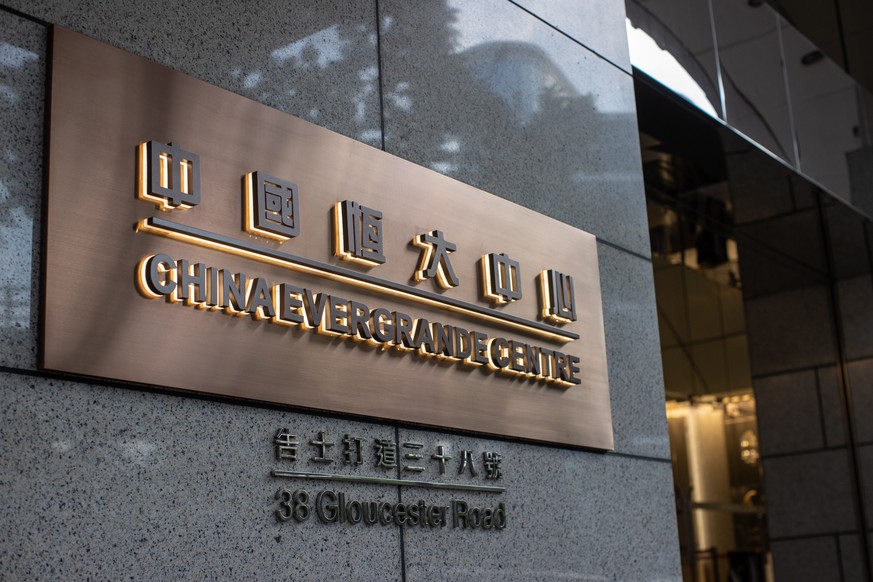 epa09469323 Signage for China Evergrande Centre is displayed at the building&#039;s entrance in Hong Kong, China, 15 September 2021. Chinese property developer Evergrande said on 14 September that its ...