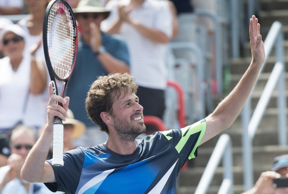 Robin Haase, of the Netherlands, celebrates his victory over Diego Schwartzman, of Argentina, in a quarterfinal match at the Rogers Cup tennis tournament in Montreal, Friday, Aug. 11, 2017. (Paul Chia ...