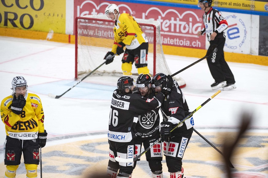 Lugano&#039;s player Julian Walker celebrate the score 3-1 during the preliminary round game of National League A (NLA) Swiss Championship 2021/22 between HC Lugano and SC Bern at the ice stadium Corn ...