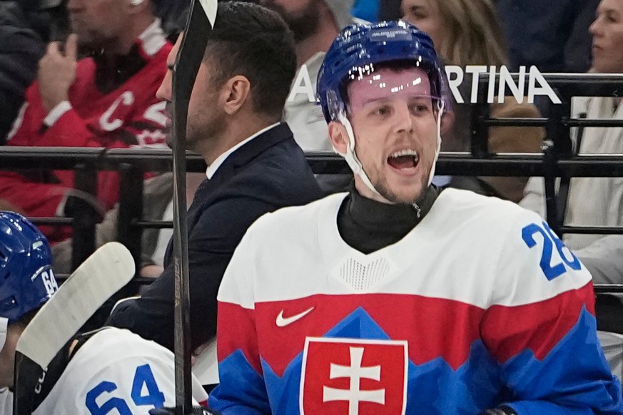 Slovakia's Martin Gernat yells during a men's ice hockey bronze medal game between Slovakia and Finland at the 2026 Winter Olympics, in Milan, Italy, Saturday, Feb. 21, 2026. (AP Photo/Hassa ...