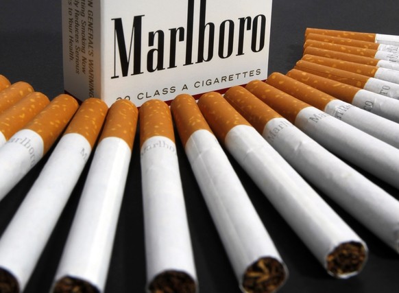 FILE - In this July 17, 2012 file photo, Marlboro cigarettes are displayed in Montpelier, Vt. The chief executive of the company that makes Marlboro cigarettes was quoted by Britain&#039;s Mail on Sun ...