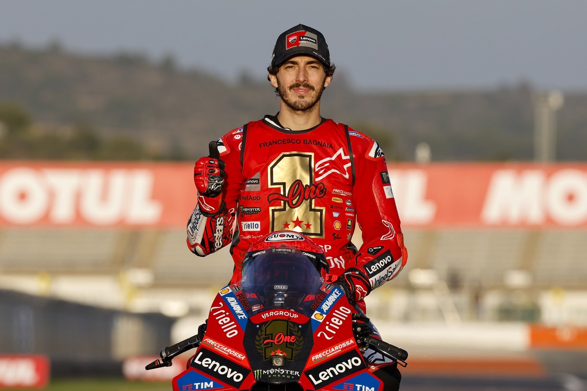 Moto GP World Champion Italian rider Francesco Bagnaia of the Ducati Lenovo Team poses after the last race of the season, at the Ricardo Tormo circuit in Cheste near Valencia, Spain, Sunday, Nov. 26,  ...