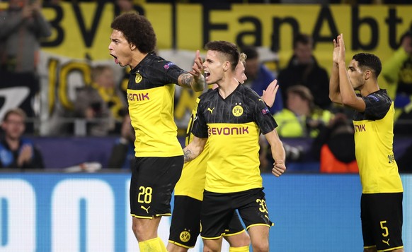 epa07975161 Dortmund&#039;s Axel Witsel (L) and Julian Weigl (C) celebrate during the UEFA Champions League group F soccer match between Borussia Dortmund and Inter Milan in Dortmund, Germany, 05 Nove ...