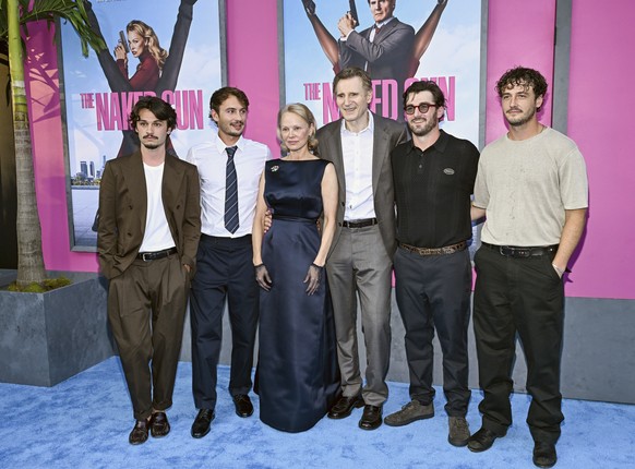 Dylan Lee, from left, Brandon Lee, Pamela Anderson, Liam Neeson, Daniel Neeson and Miche�l Richardson attend the premiere of Paramount Pictures&#039; &quot;The Naked Gun&quot; at the SVA Theater on Mo ...