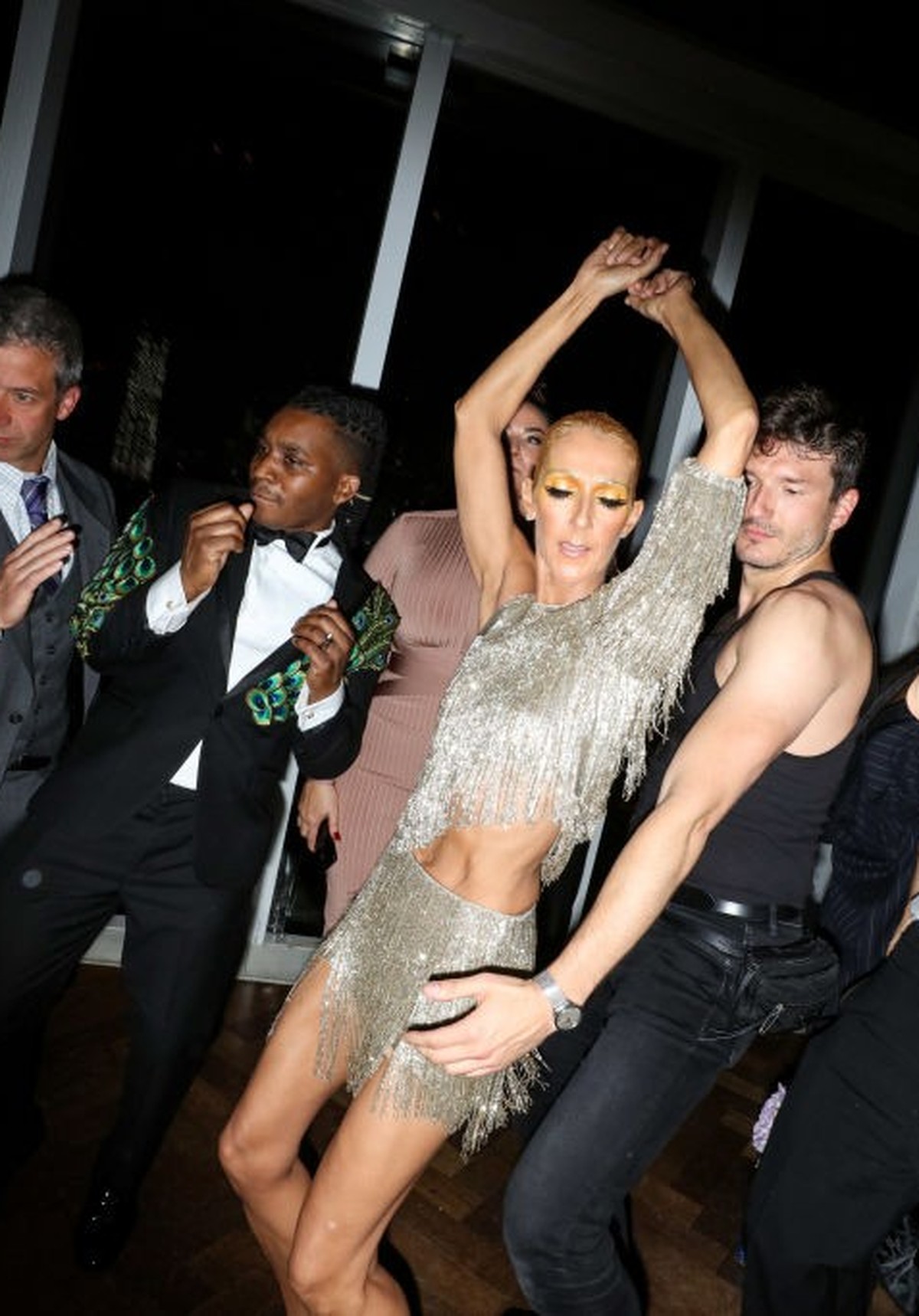 NEW YORK, NY - MAY 06: Celine Dion (L) dances with Pepe Munoz at the Met Gala "Boom Boom Afterparty" at Top of the Standard on May 6, 2019 in New York City. (Photo by Rebecca Smeyne/Getty Im ...